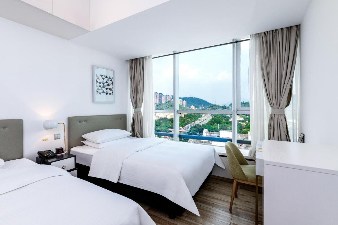Golden Central Hotel Serviced Residence-Xin Hao E Du Shenzhen Exterior foto